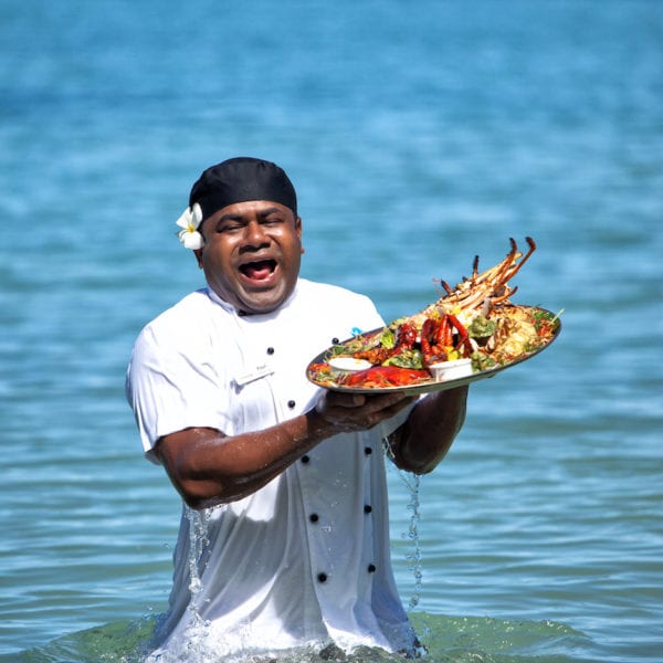 Tropica Island Resort | Chef Holding Seafood